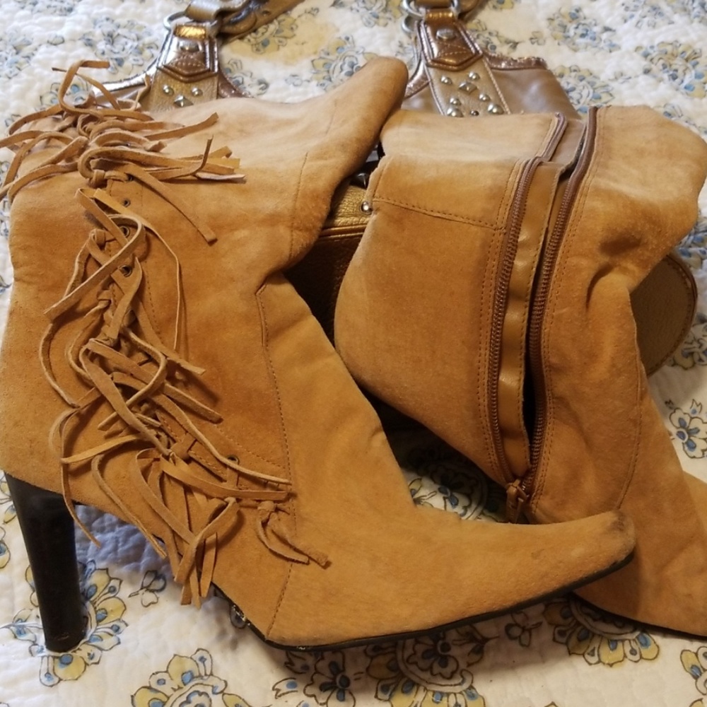 High heeled fringed suede boots